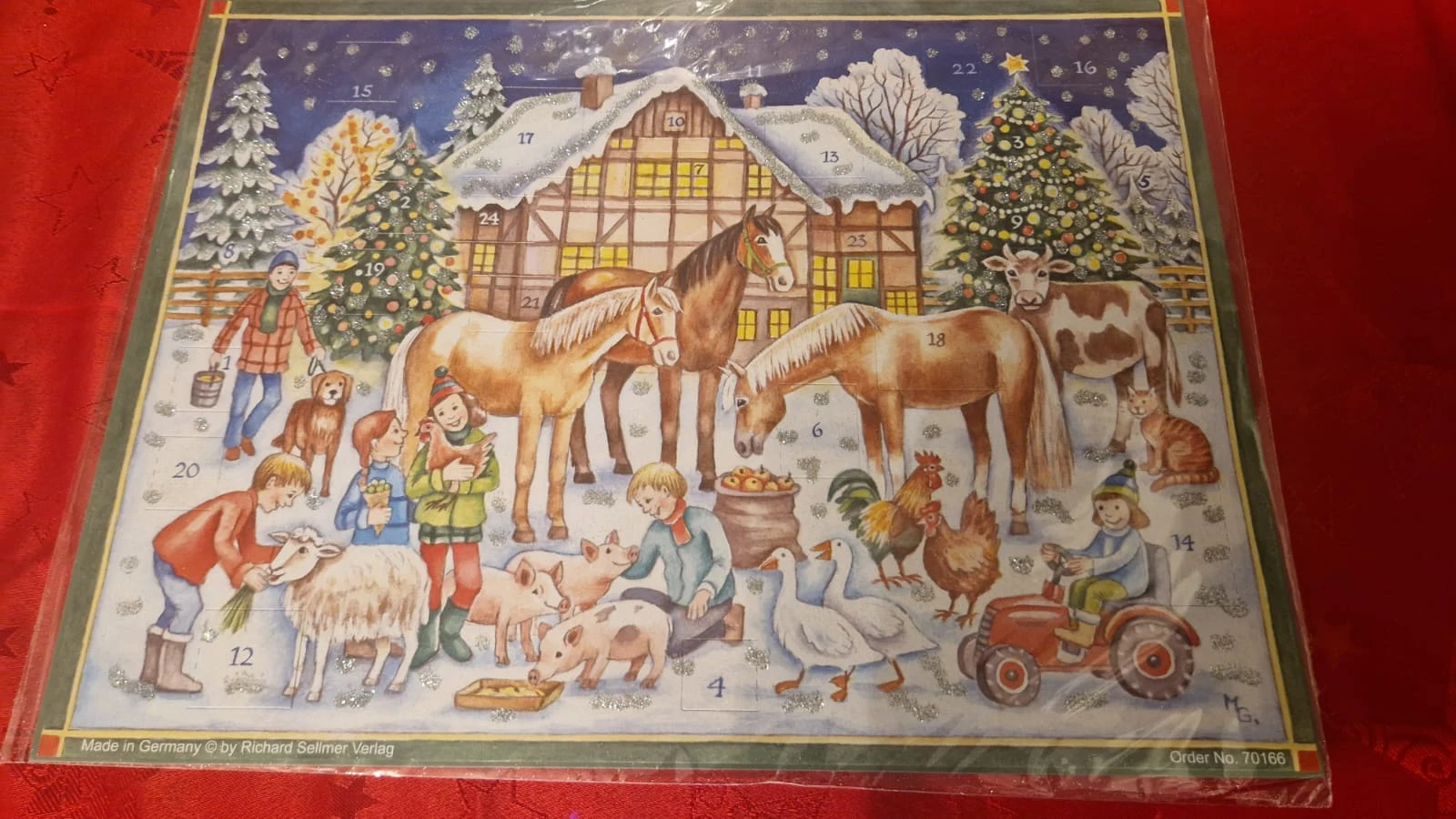 Sellmer Adventskalender mit winterlichem Bauernhof und Tieren